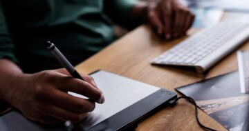 close-up-people-s-hand-working-computer_53876-14371